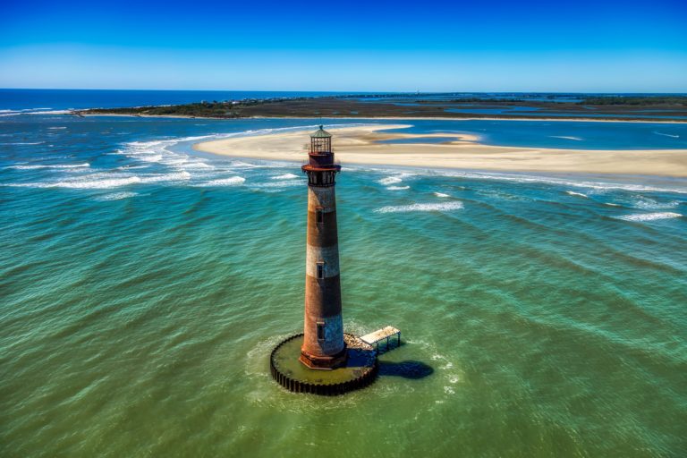 VIEW THE MORRIS ISLAND LIGHTHOUSE FROM FOLLY BEACH